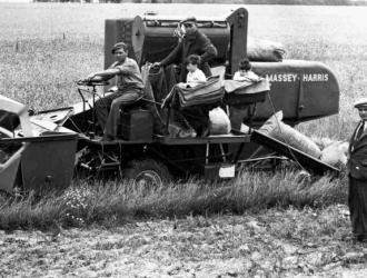 Believed to be the first combine harvester  in Suffolk.